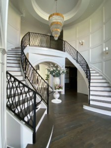 Double staircase in entryway of home in Olde Stone.