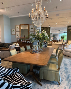 A dining table decorated at market for interior designers.